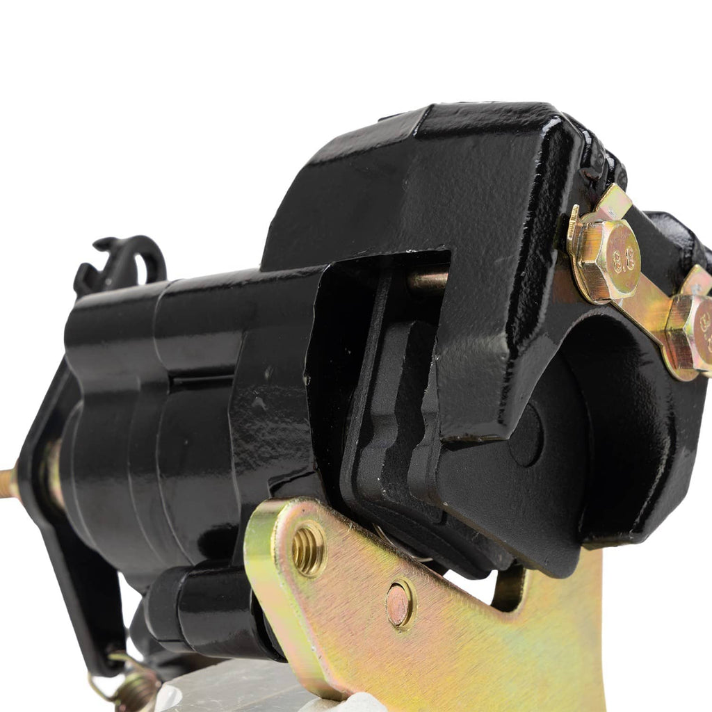 Rear brake caliper close-up with black actuator housing and mounting plate