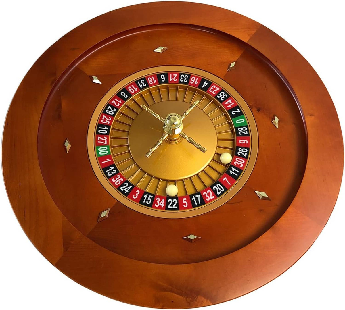 Brown wooden roulette wheel with gold inner numbers and metal pointer