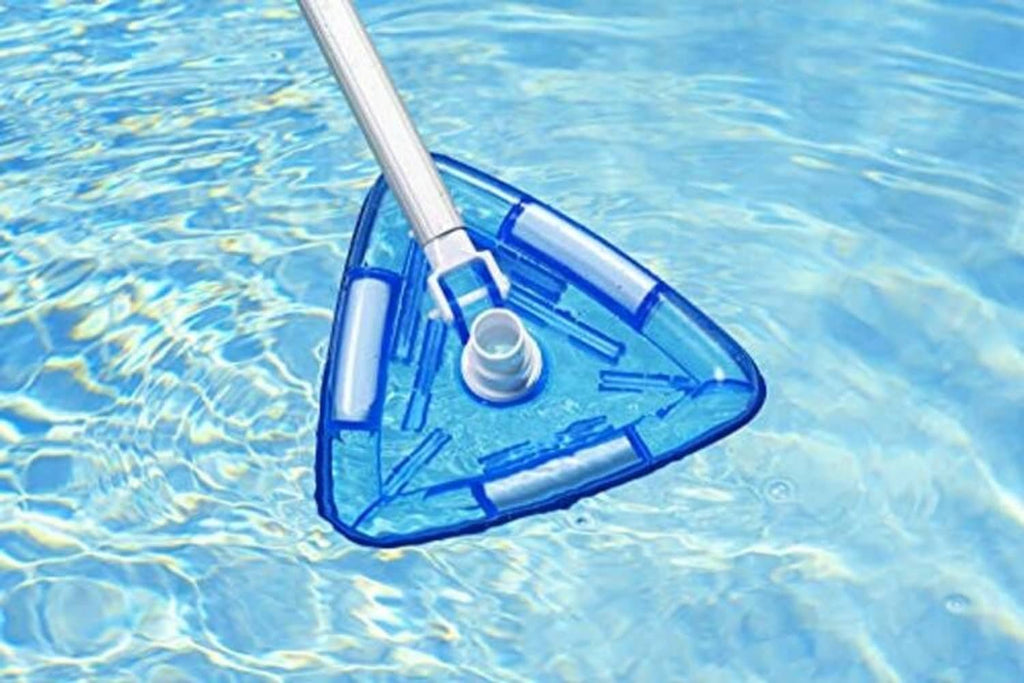 Triangle pool vacuum head in pool water with clear blue vinyl liner and white port