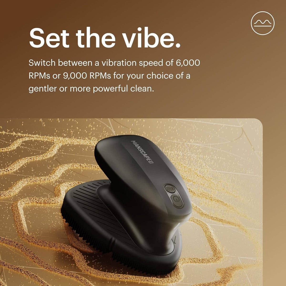 Electric face scrubber resting on surface with silicone bristle pads