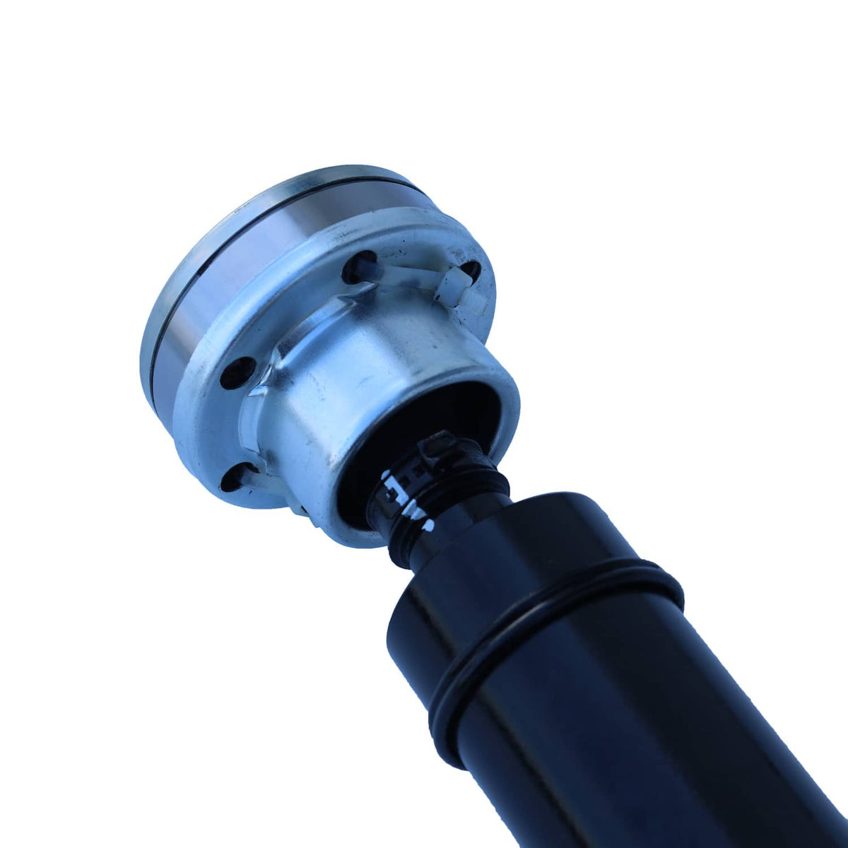 Rear driveshaft prop shaft assembly close-up of flange face and black coupling joint
