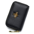 Black leather zipper card case wallet with gold bee charm on the front