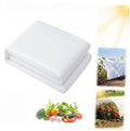 White non-woven garden sun shade cloth, neatly folded rectangular stack