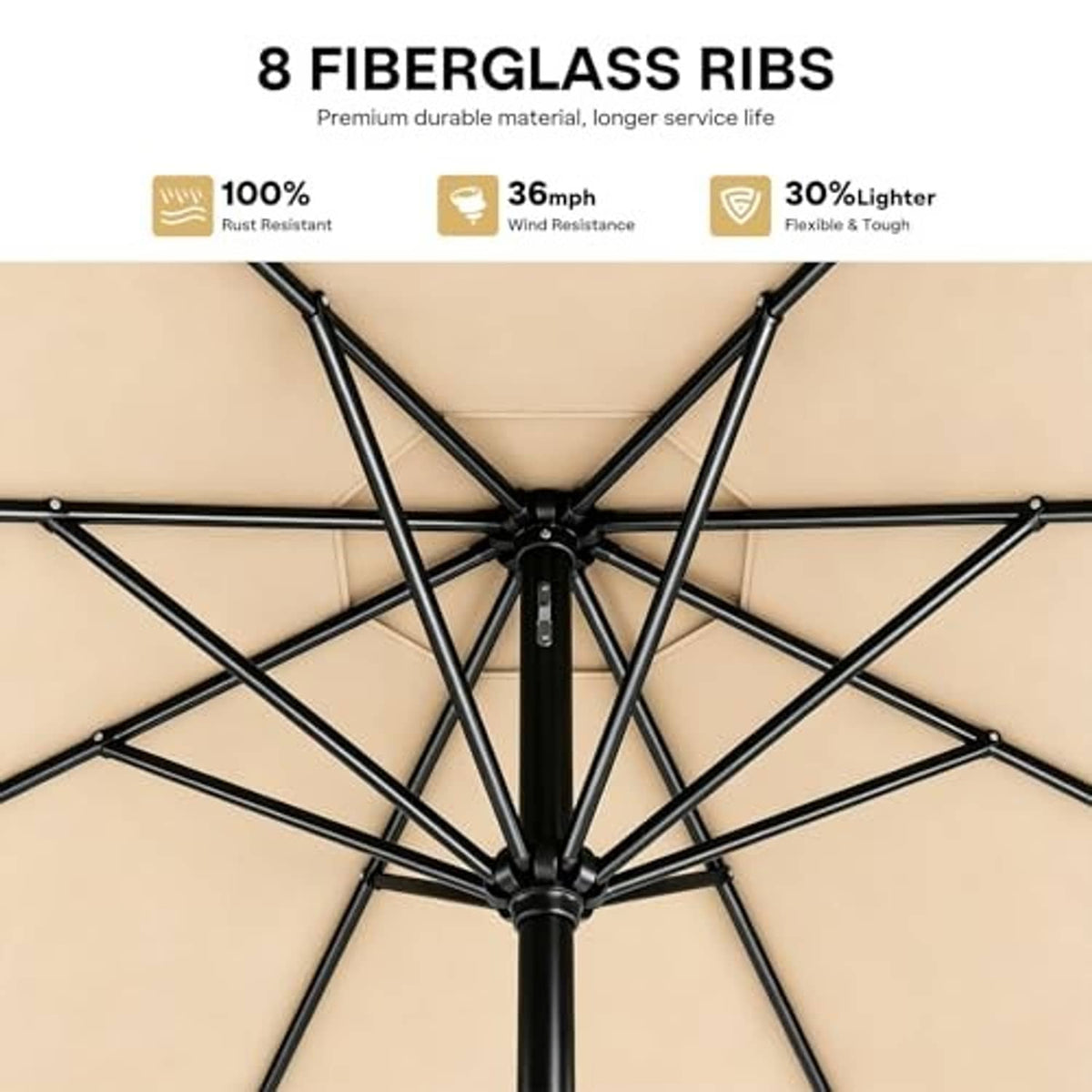 Underside of beige patio umbrella with black rib frame and central hub