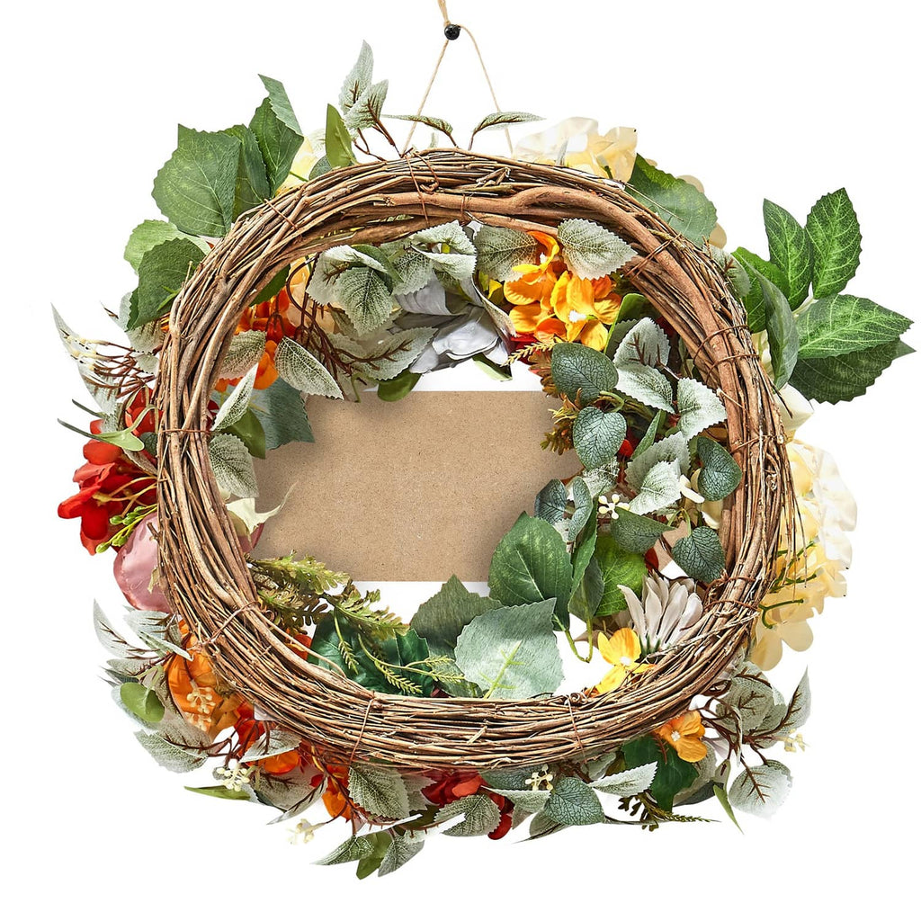 Grapevine floral wreath with green leaves, red-orange-yellow blooms, and hanging loop
