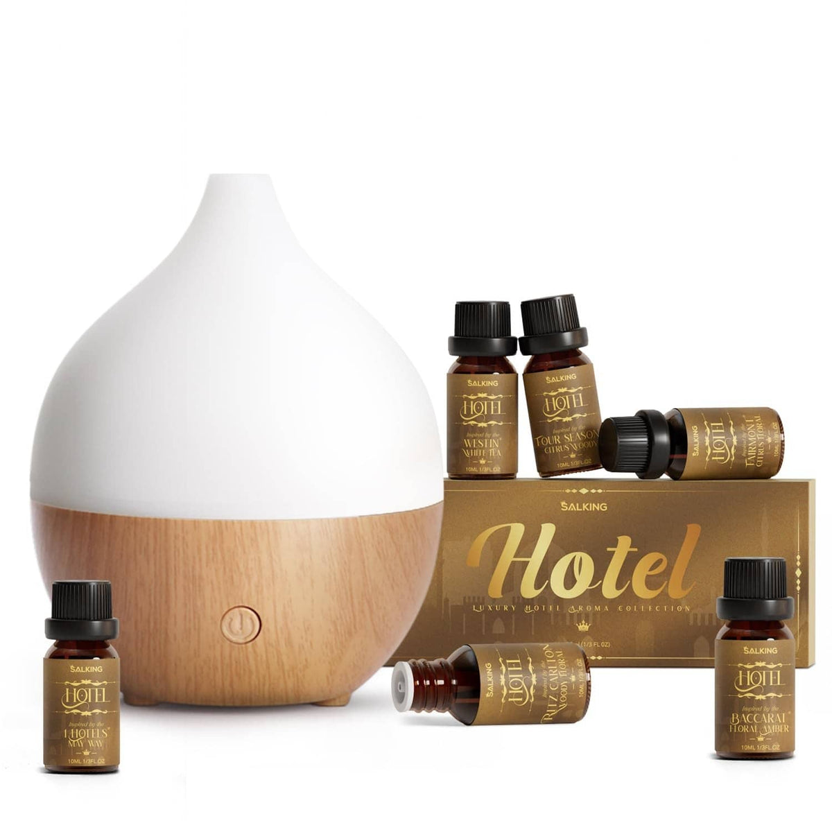 Droplet essential oil diffuser with white top and wood base, with included scent oil bottles