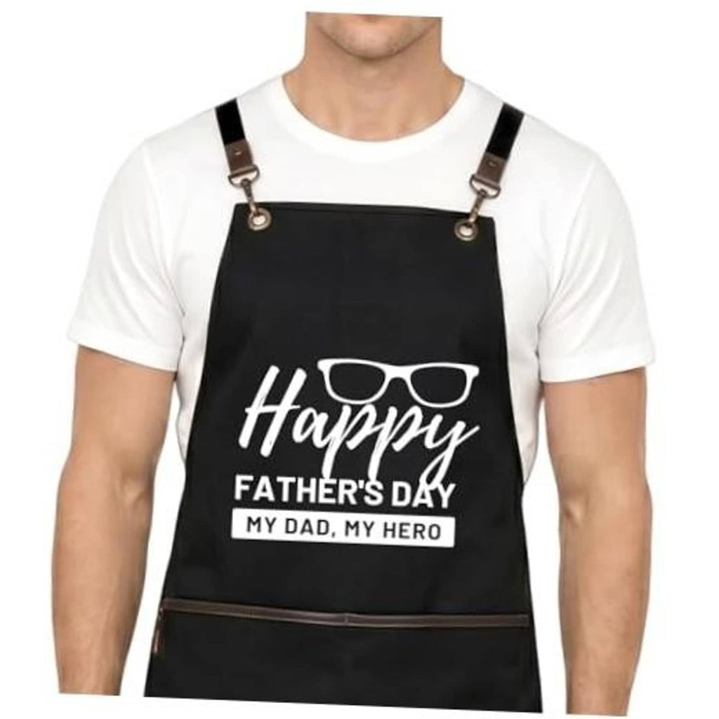 Black BBQ apron with cross-back straps and Happy Father's Day print on front