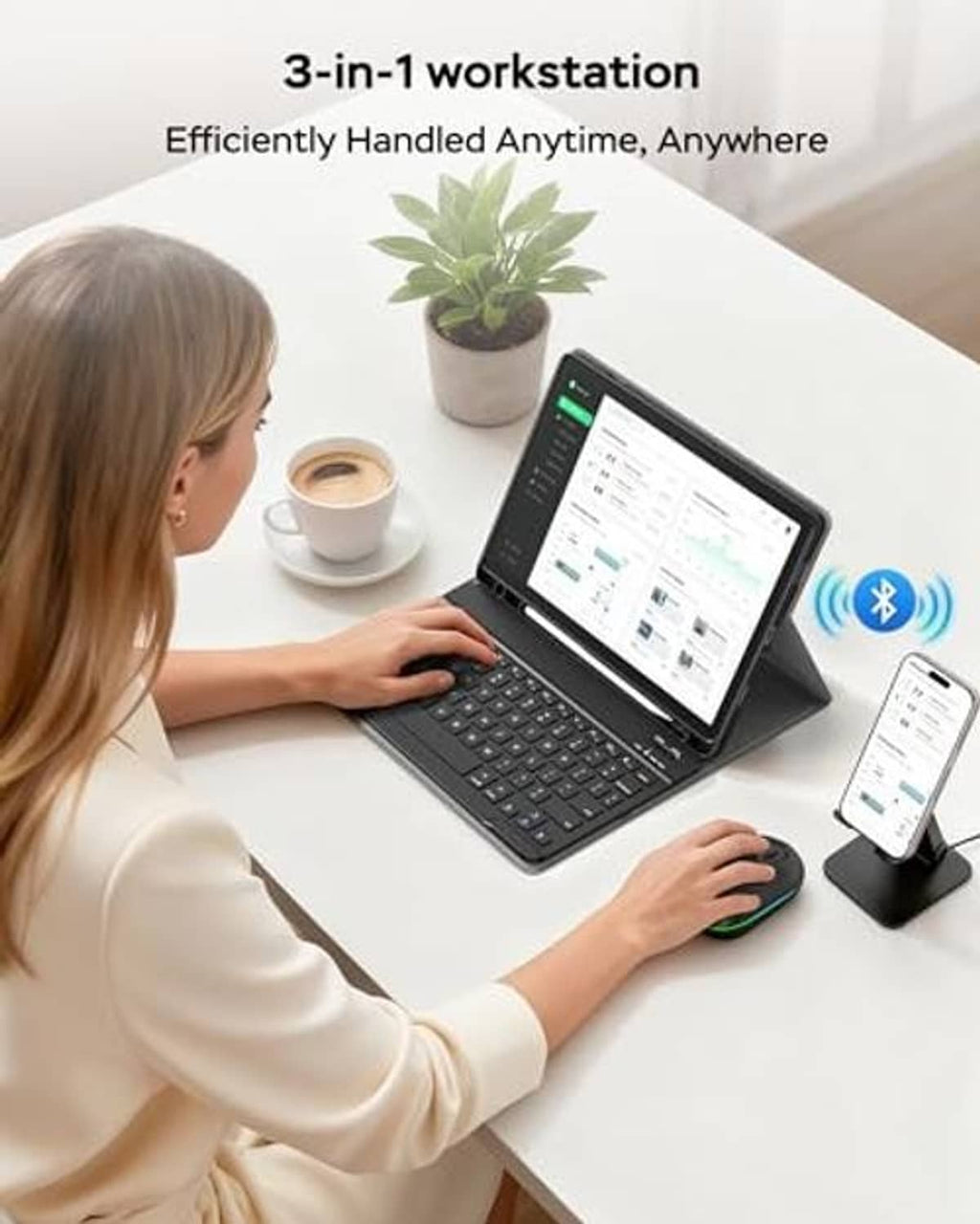 Tablet keyboard case on desk with wireless mouse and paired phone stand