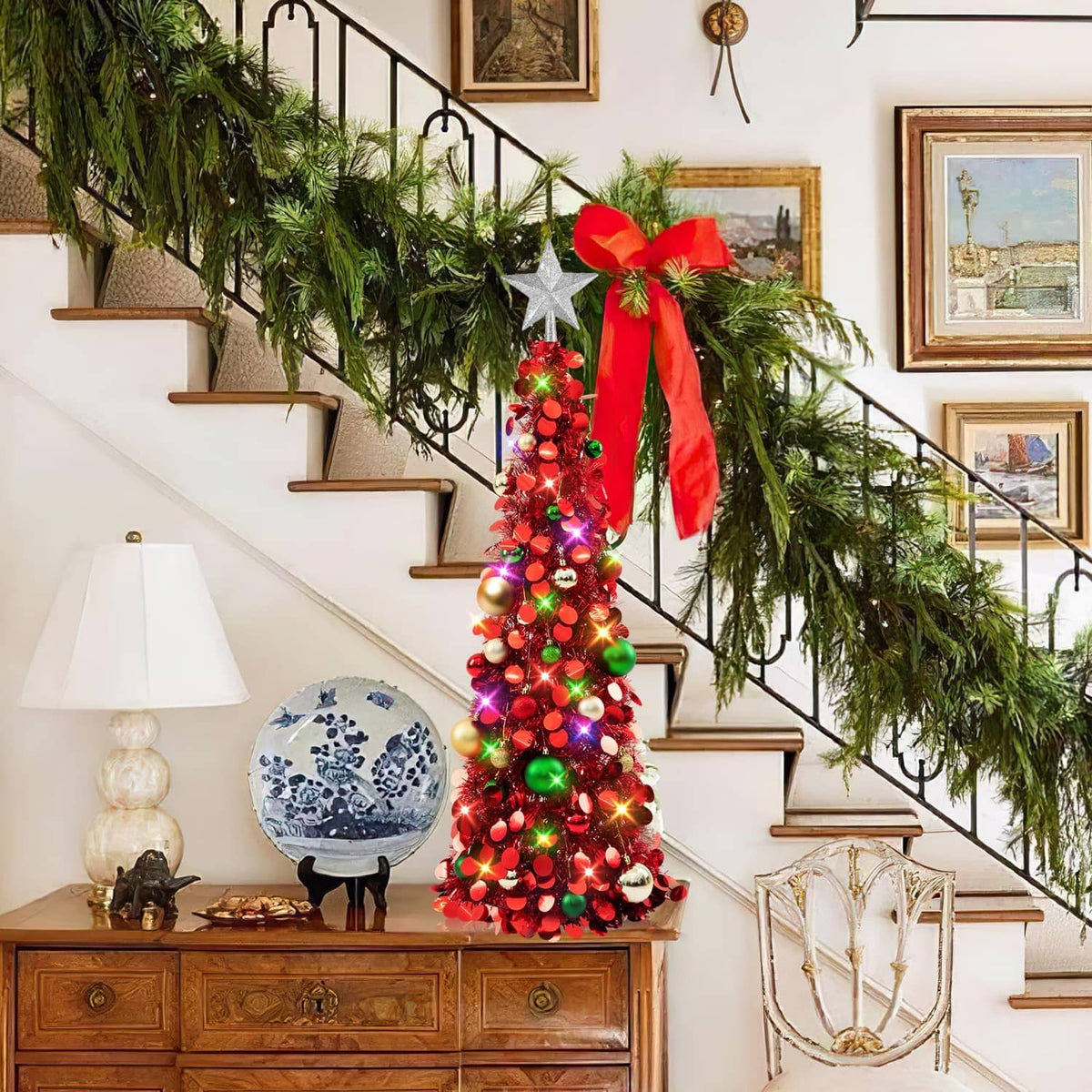 Red pop-up Christmas tree with glowing multicolor LED lights, ornaments, and star topper