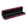 Red velvet necklace box with open lid and black insert for long chain storage