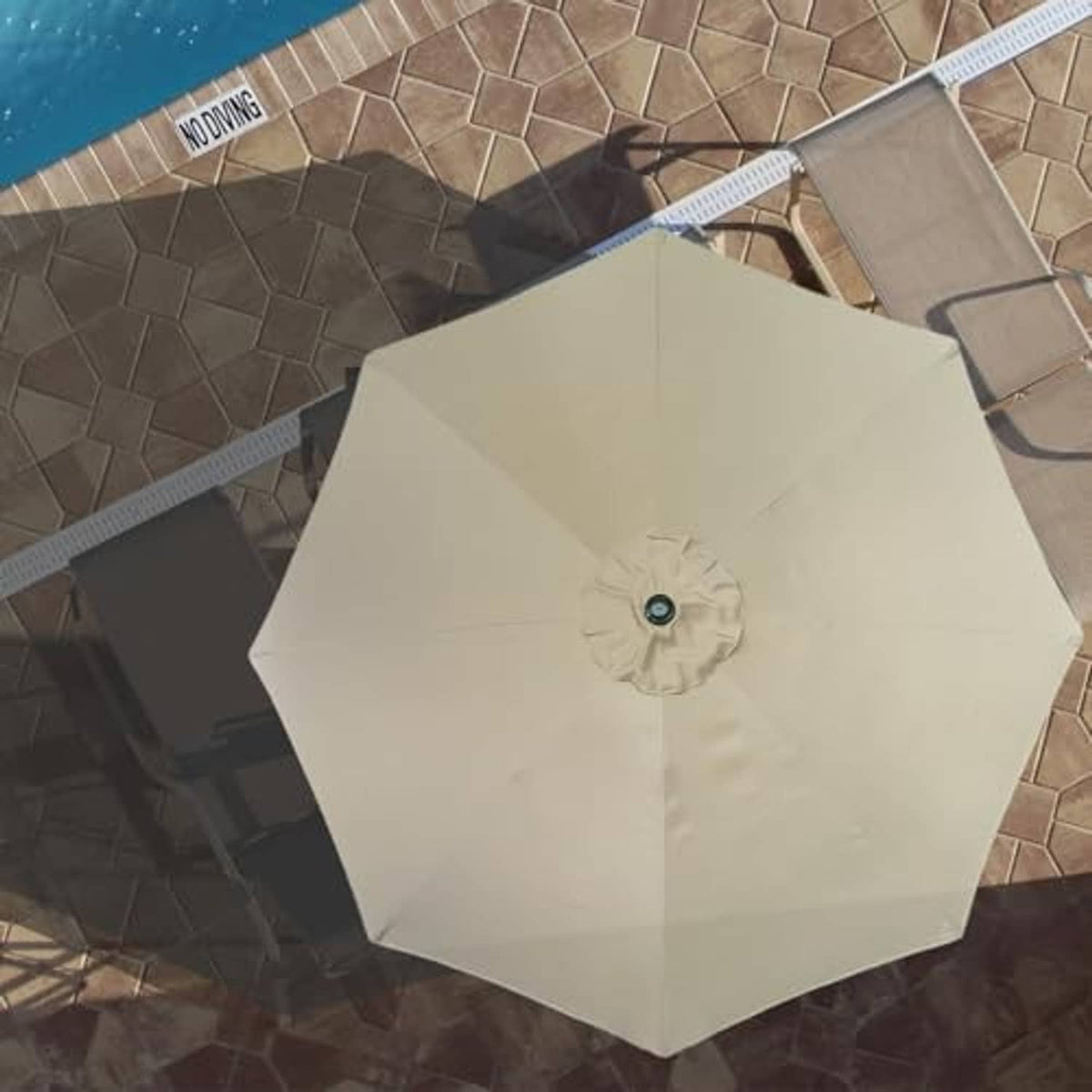 Beige patio umbrella replacement canopy viewed from above with top vent button