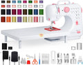 Portable electric sewing machine with pink accents and flat work table