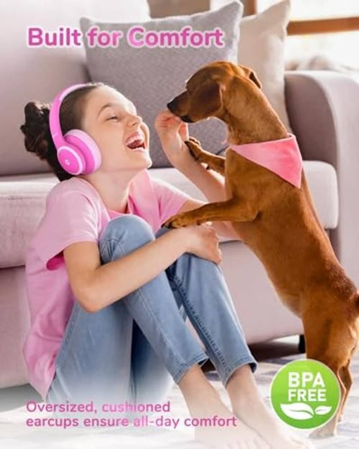 Rose pink kids over-ear headphones with cushioned earcups, child wearing