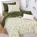 Olive comforter set with green botanical leaf print and matching pillowcases