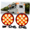 Set of two amber round emergency strobe lights with black cables and mounting bases