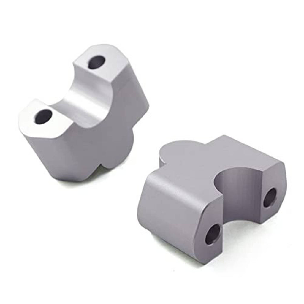 Silver CNC aluminum handlebar risers with cutout and two mounting holes each
