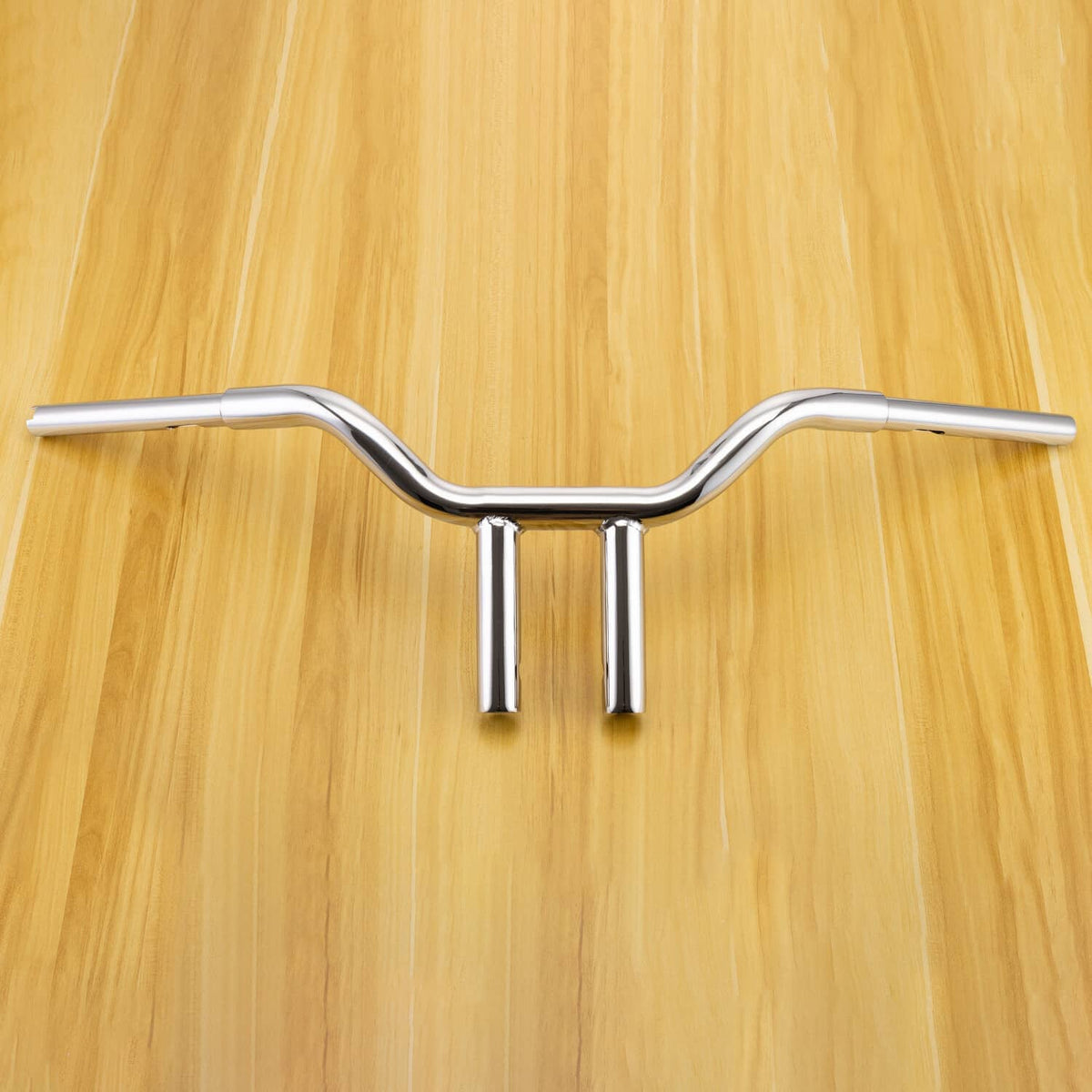 Chrome 10-inch MX T-bar handlebar, straight center with smooth curved rise