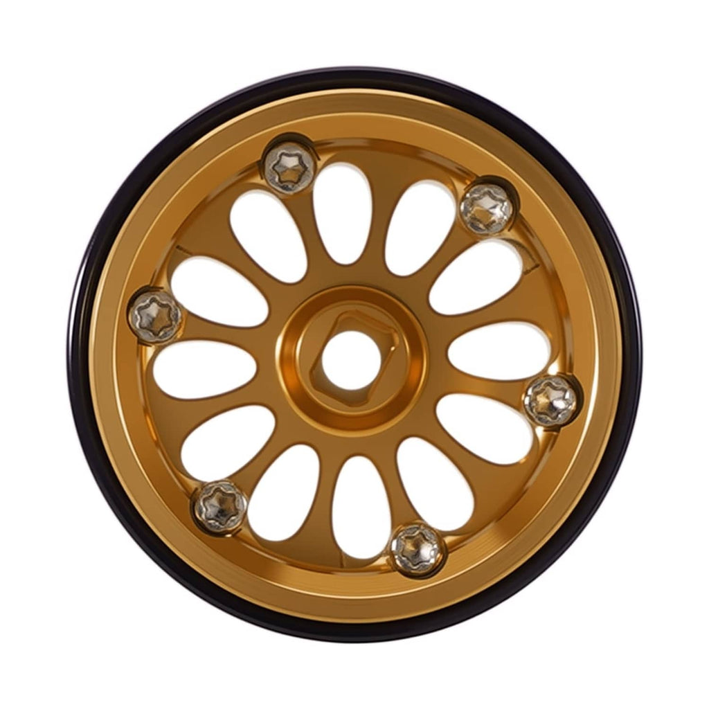 Gold beadlock wheel front view with black tire, star spokes, steel lug bolts