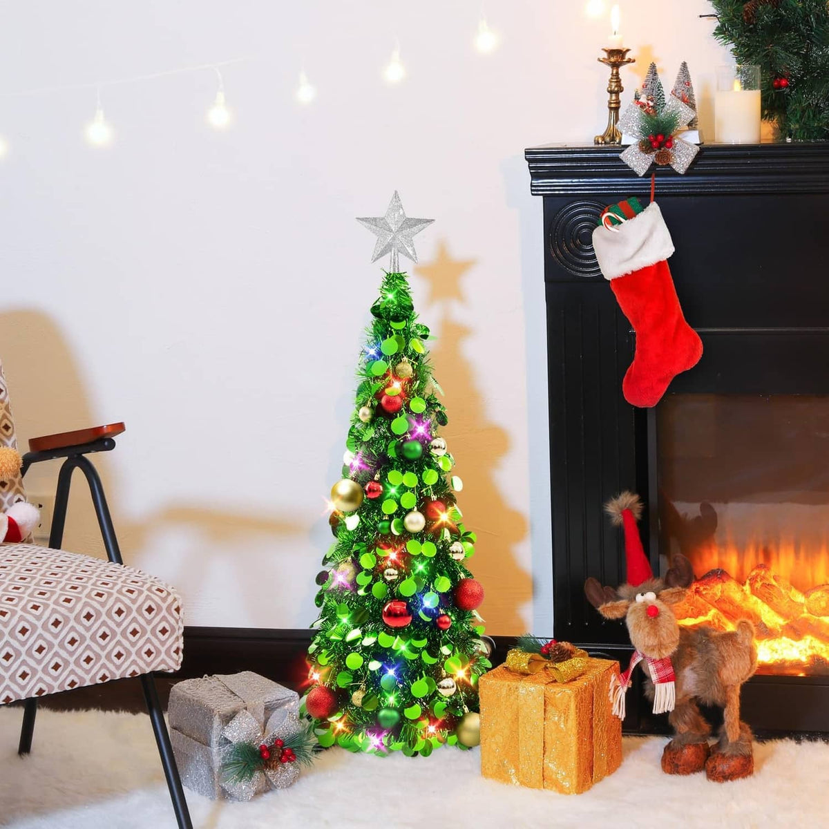 Lit 3ft tinsel Christmas tree with silver star topper, green foliage, multicolor LED glow