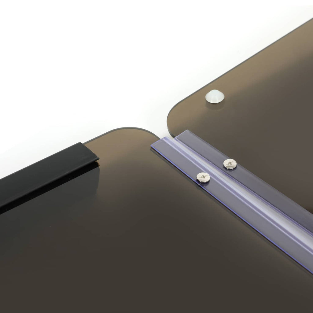 Close-up of tinted windscreen edge with fasteners and side bracket