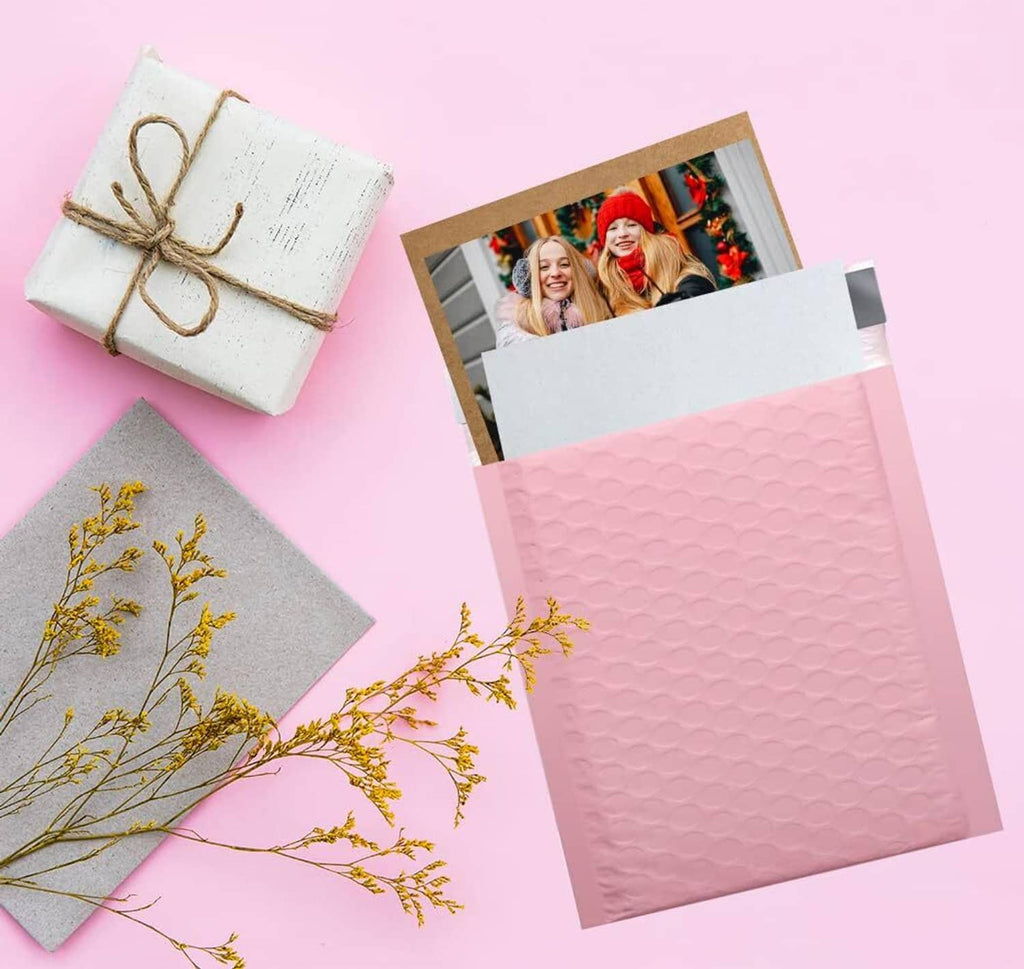 Textured cardboard envelopes with string-tied gift box and photo cutout