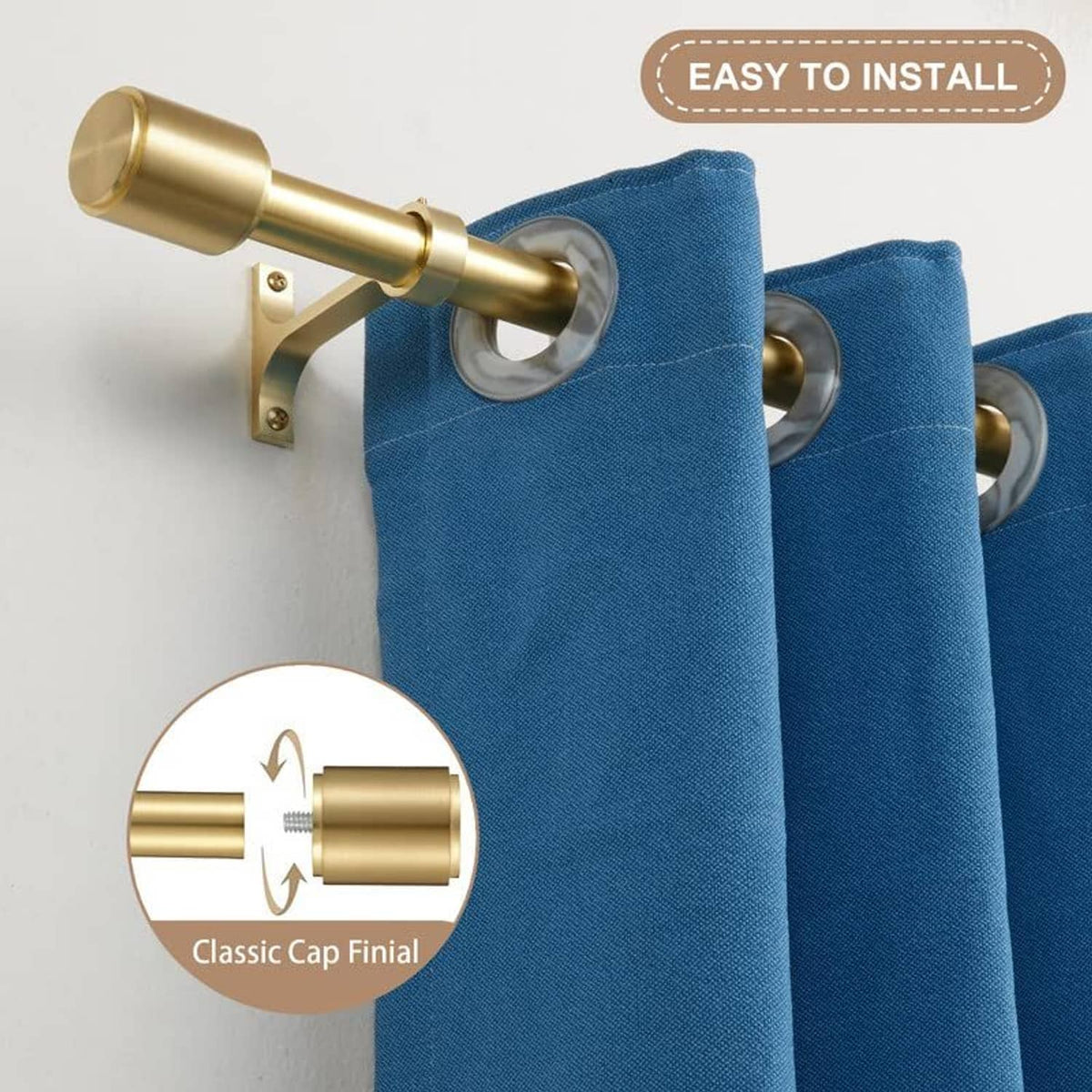 Gold curtain rod with cylindrical cap finials and two brackets holding blue fabric curtains