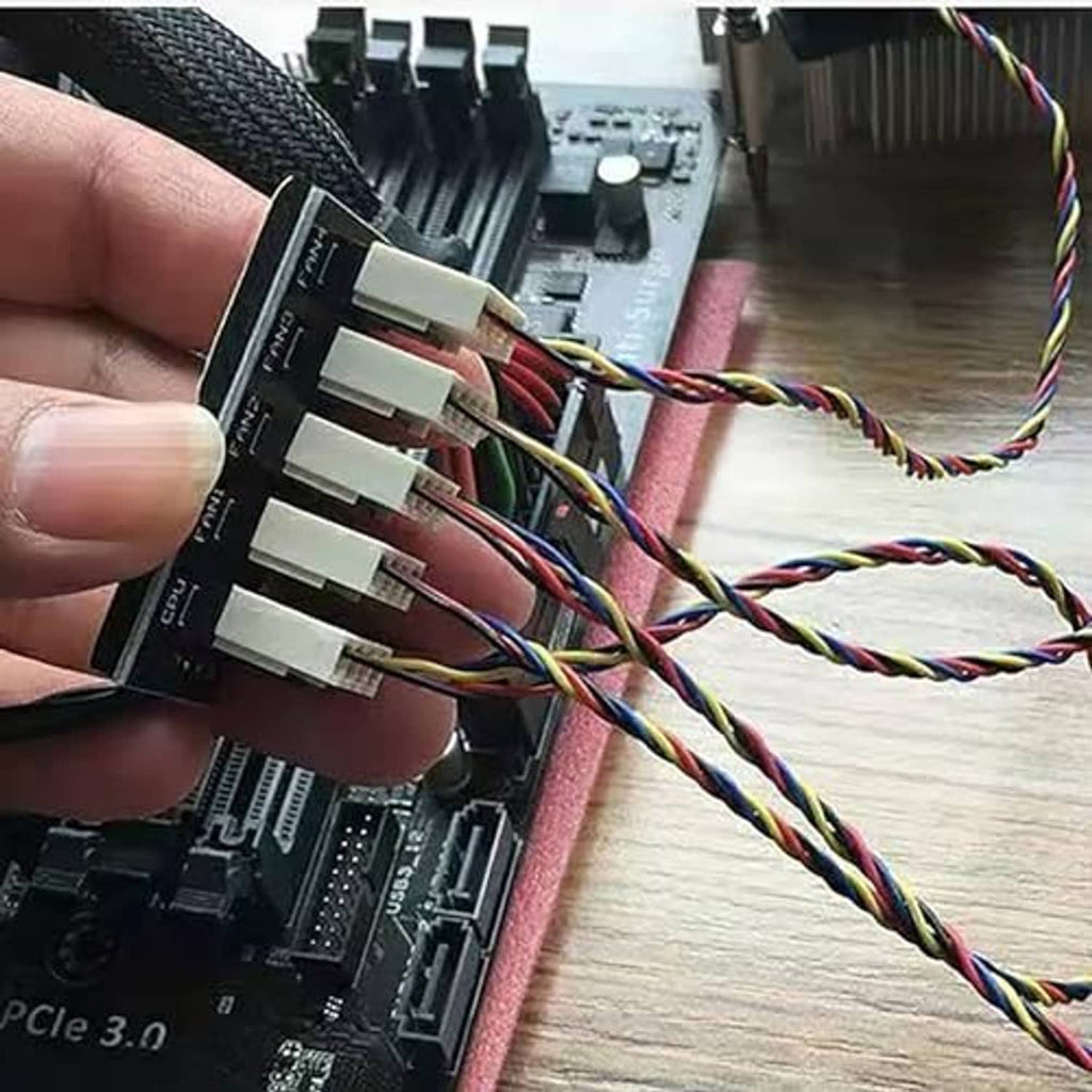 Close-up of multicolored 4-pin fan headers on PWM fan hub splitter