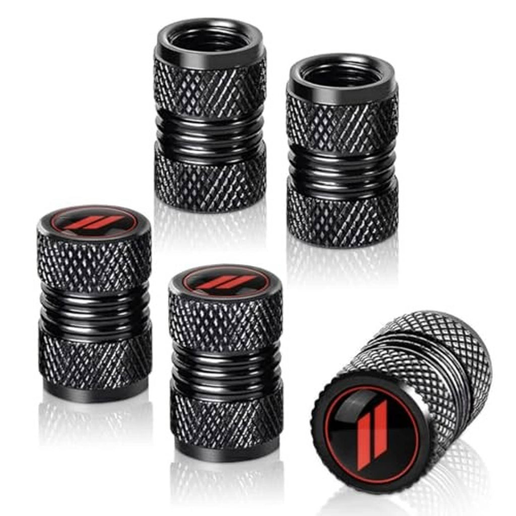 Set of black metal tire valve stem caps with textured sides and red logo detail