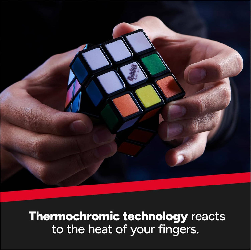 Hands holding 3x3 color-changing cube with rainbow-tinted tiles