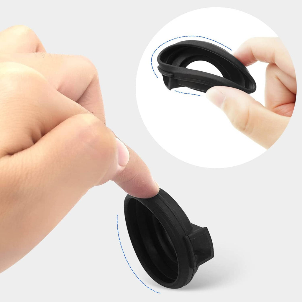 Black choke cover held by hand, molded plastic part