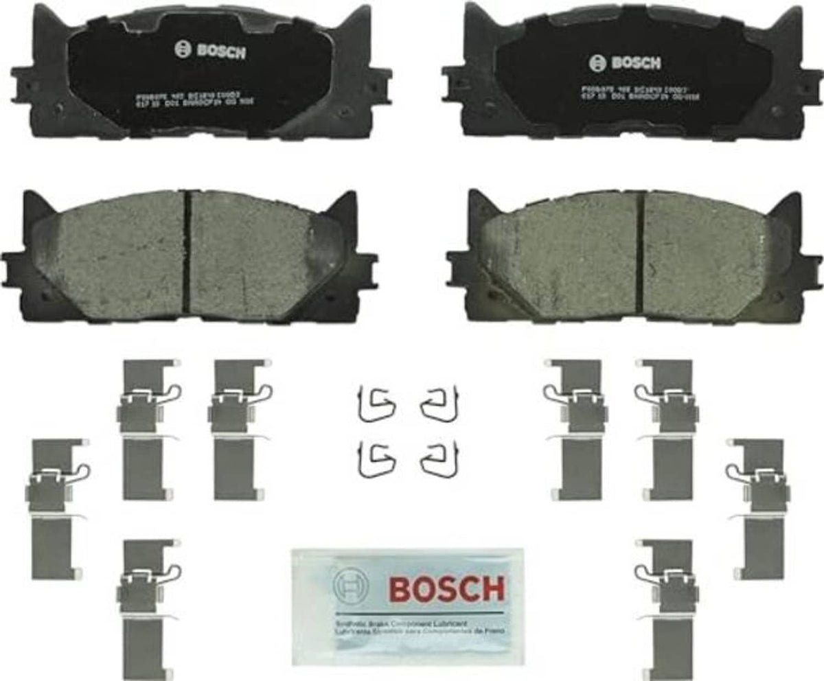 Ceramic disc brake pad set with 4 pads and hardware clips/shims; BOSCH branding