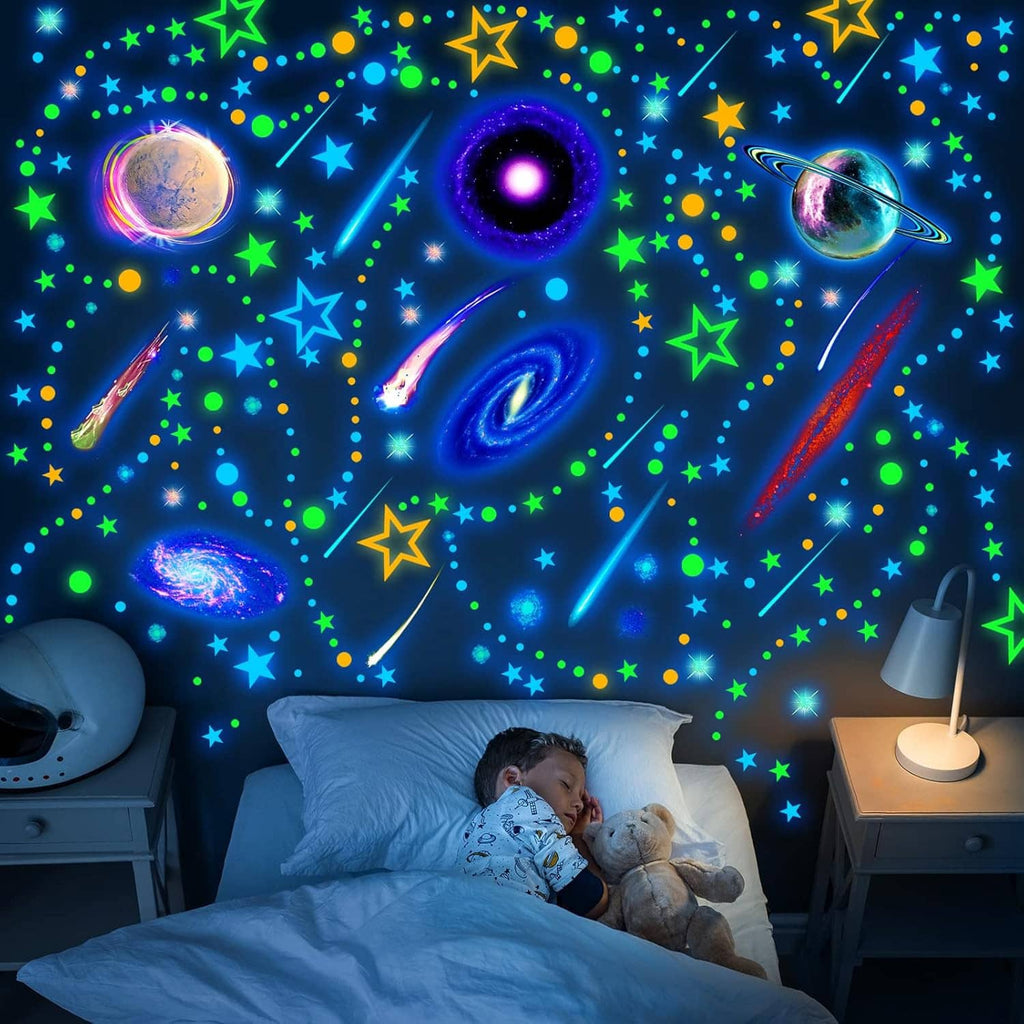 Glow-in-the-dark galaxy wall decal sheet with glowing planets, moons, and stars