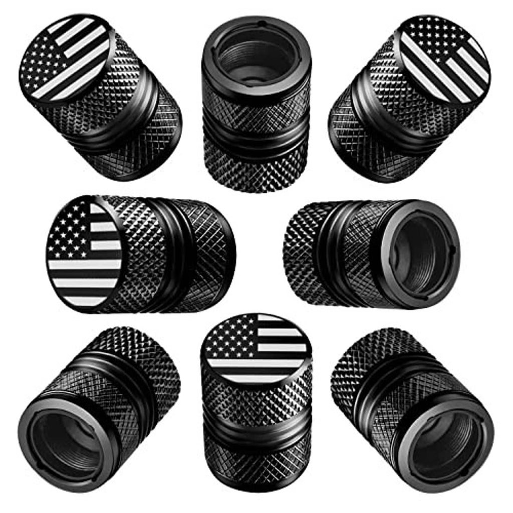 Pack of 8 black valve stem caps with American flag inserts, angled view