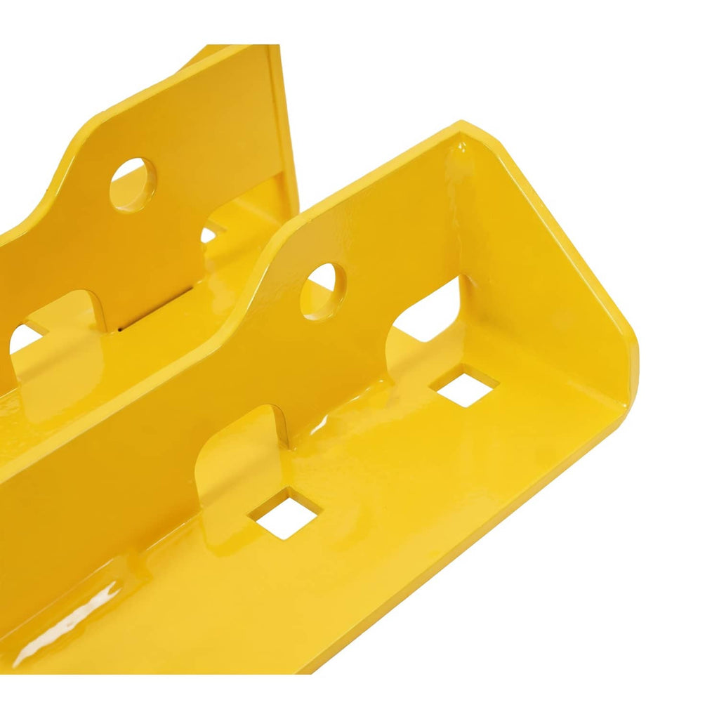 Close-up of yellow mower hitch bracket with stamped slots, cutouts, and mounting points.