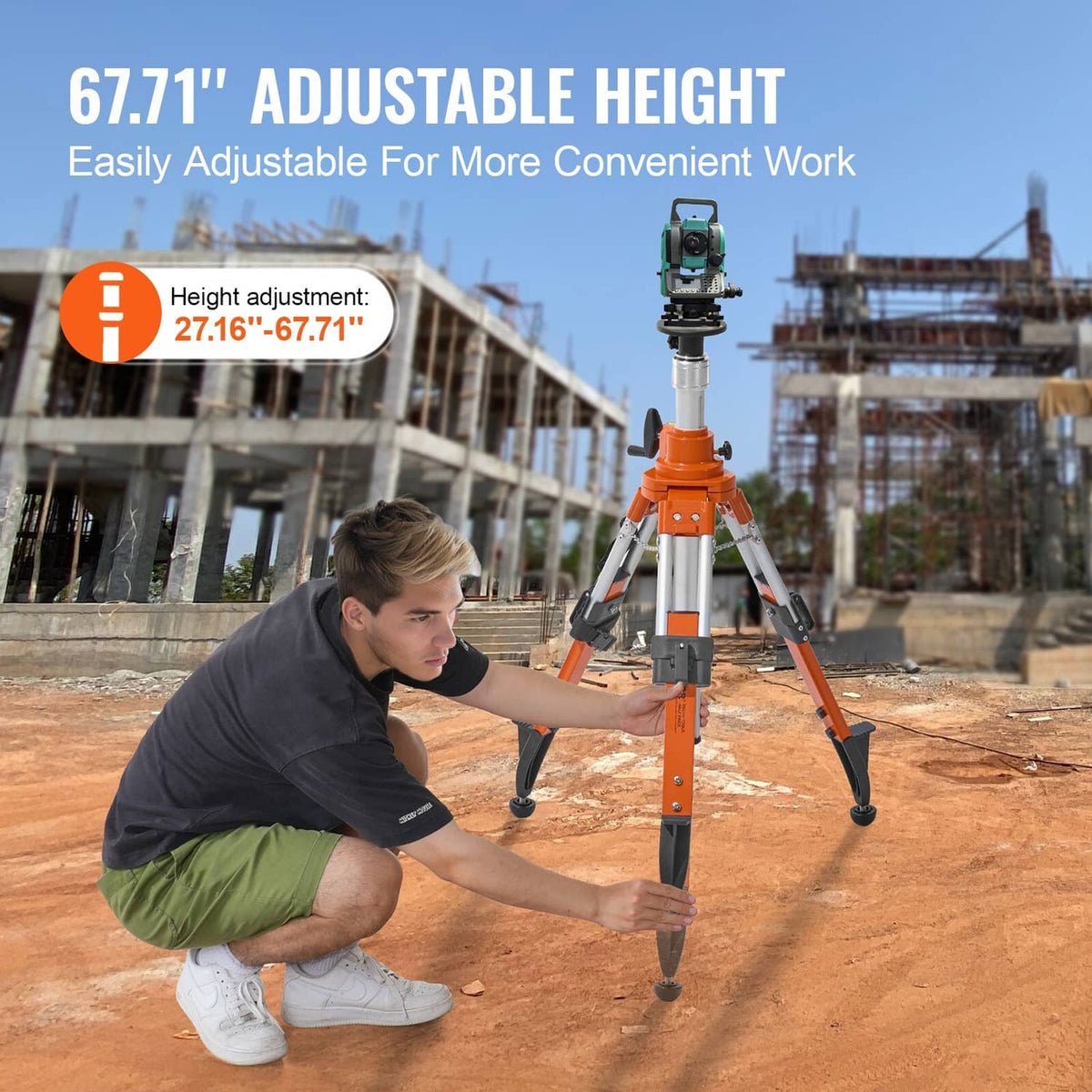 Orange laser level tripod stand in use, operator adjusting the mounted instrument