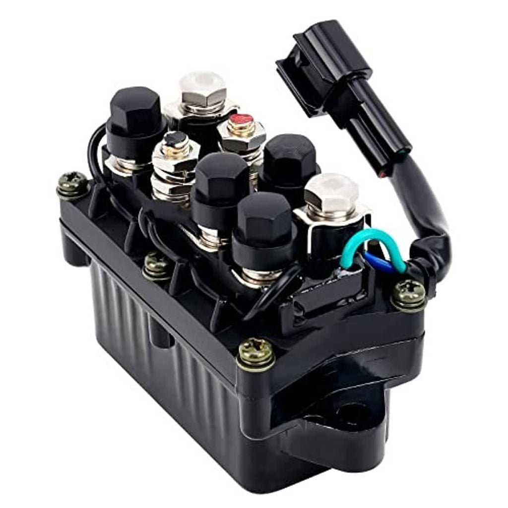 Outboard relay assembly angled view, black housing with blue wire and electrical terminals