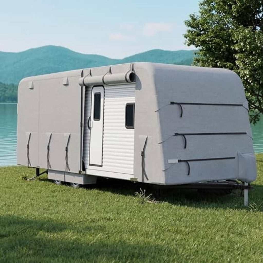 Grey RV travel trailer cover on trailer with zippered side panels and front access