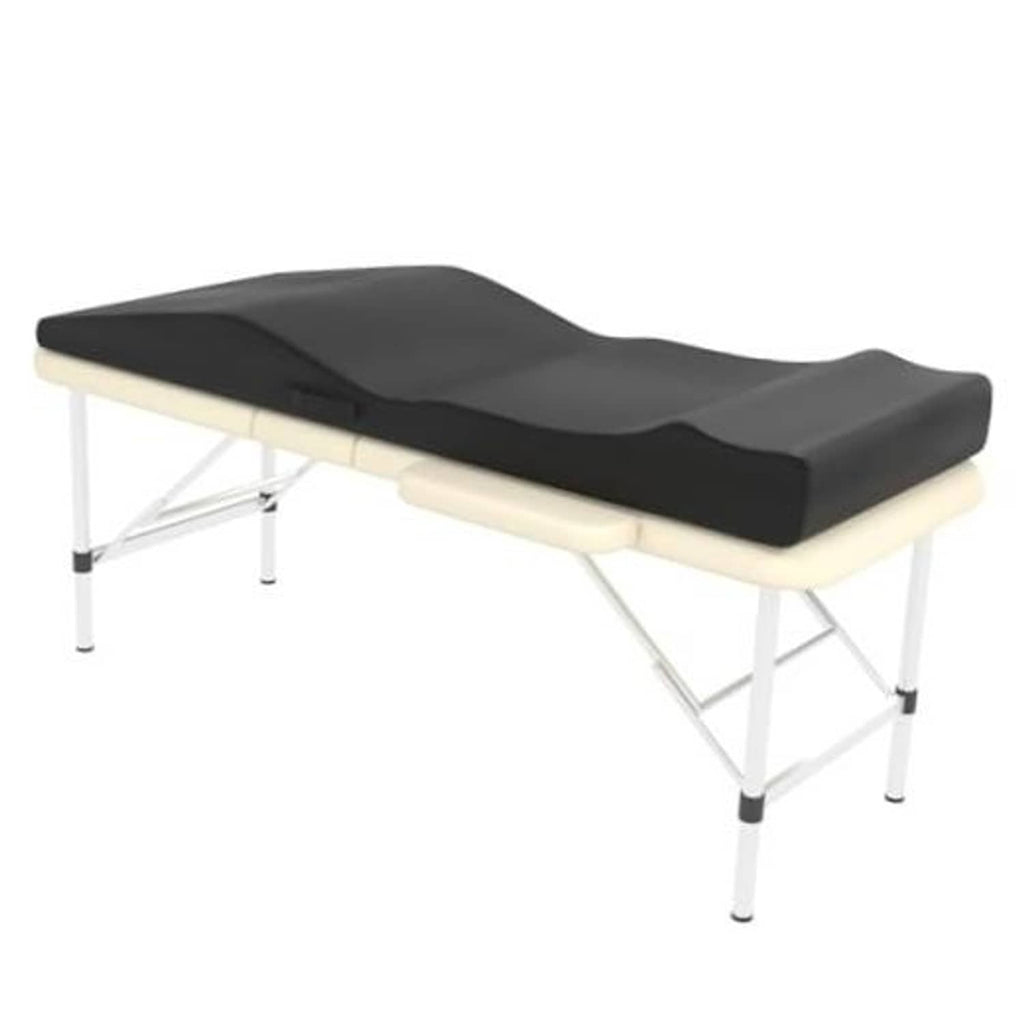 Black ergonomic massage table foam topper with contoured cushion on a folding bed frame
