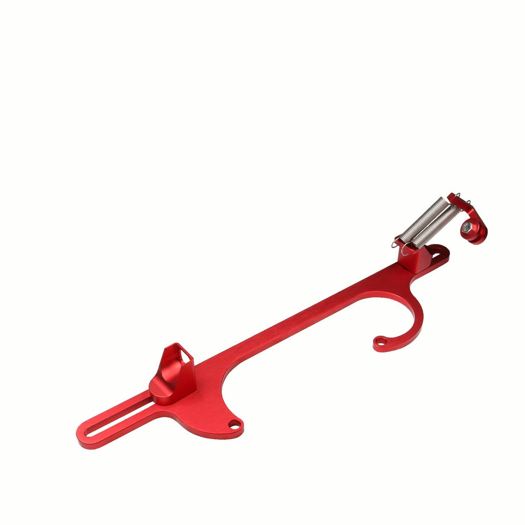 Red aluminum throttle cable bracket with curved mounting plate and spring housing