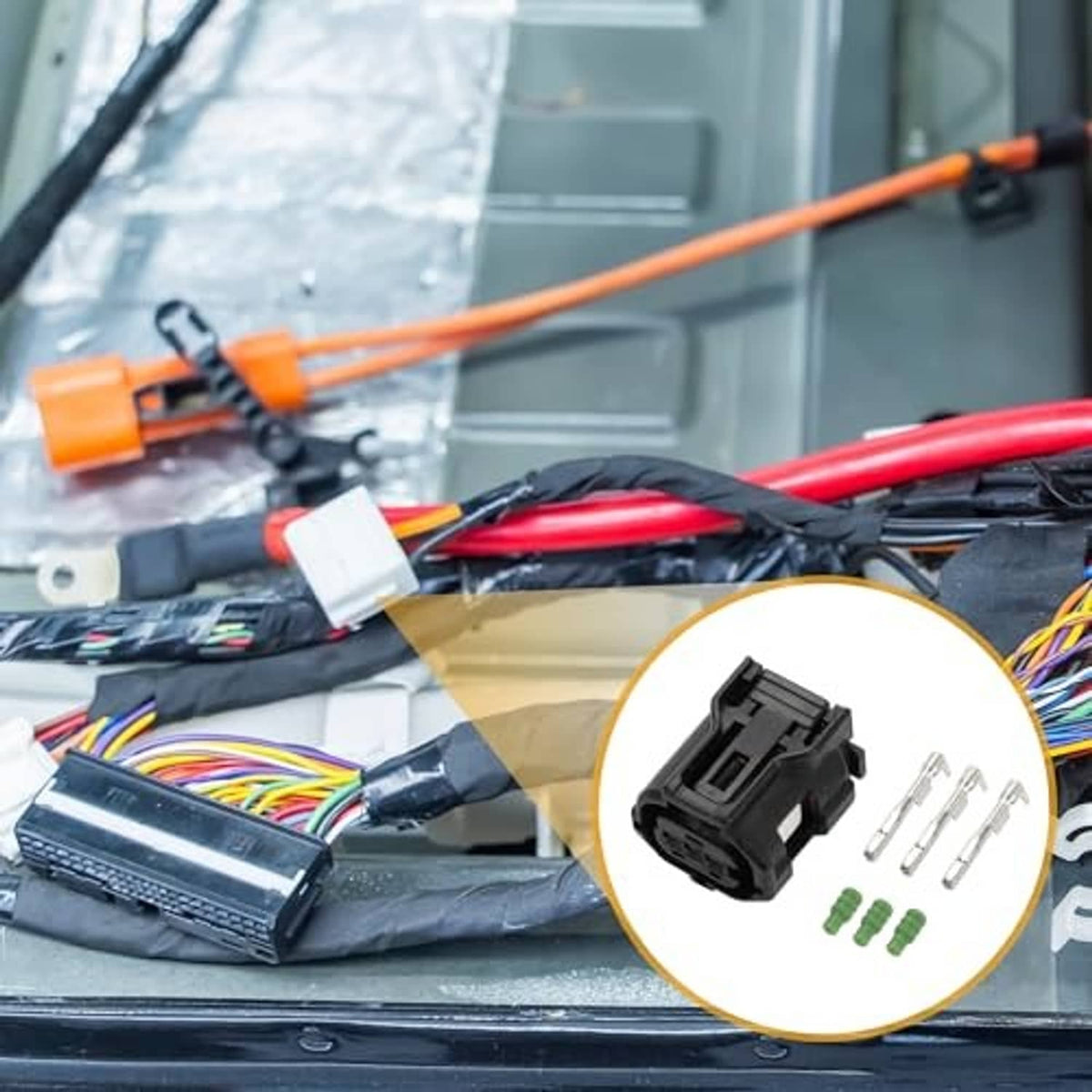 3-pin connector plug with terminals and green seals on car wiring bundle