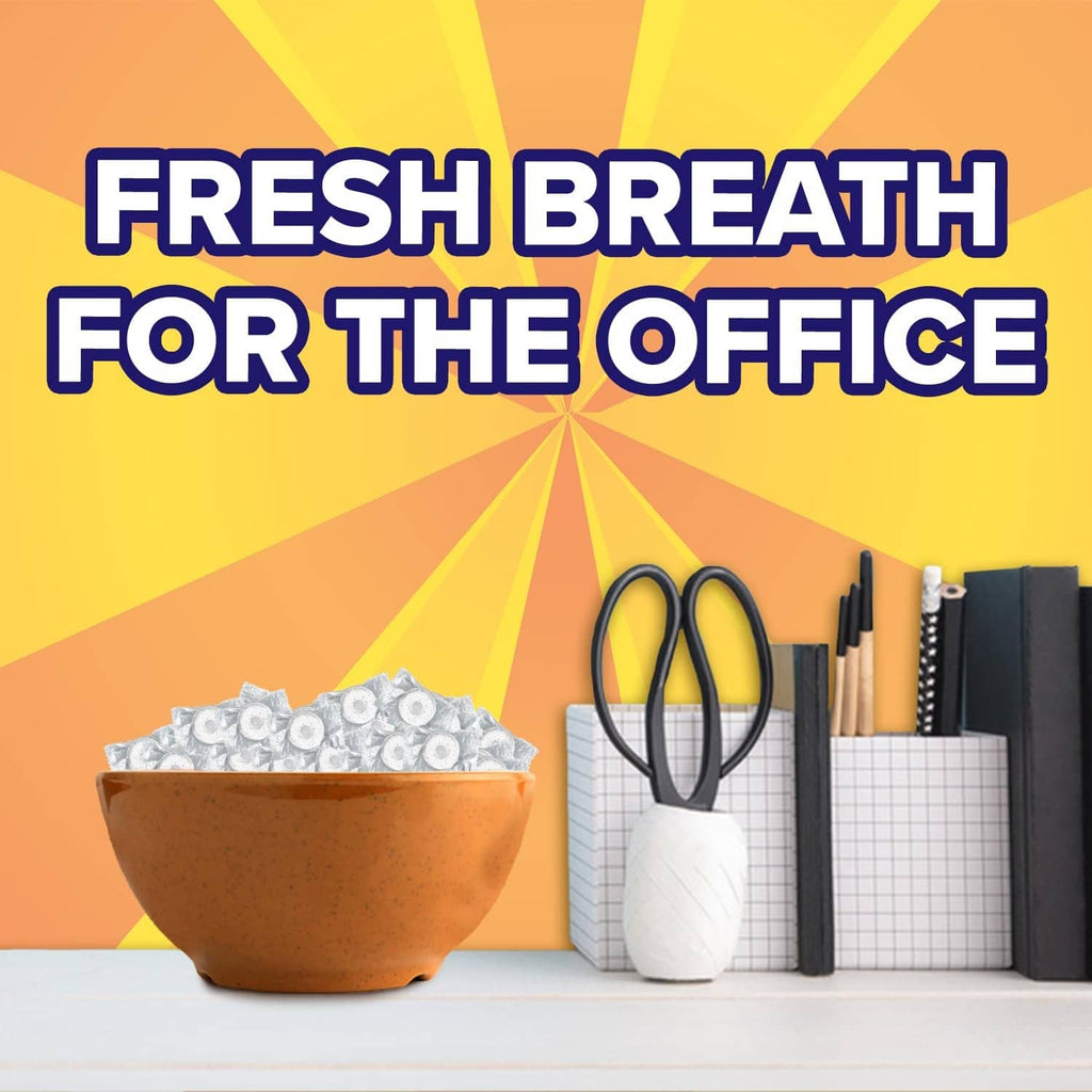 Promotional graphic reading “Fresh Breath For The Office” for orange mint candy