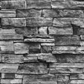 Dark gray stacked-brick peel-and-stick wallpaper with textured stone pattern.