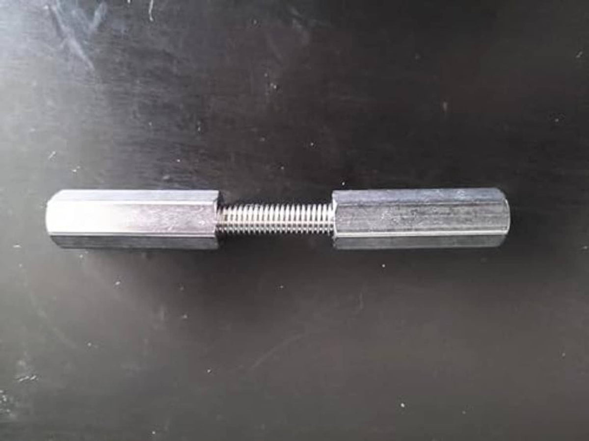 Stainless steel hex coupling nut with internal threads on a threaded rod