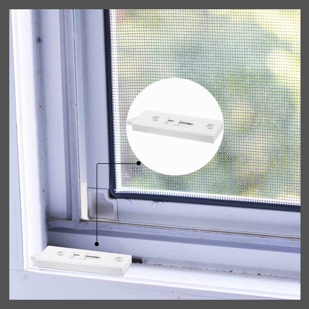 White plastic window latch lock mounted on window frame corner
