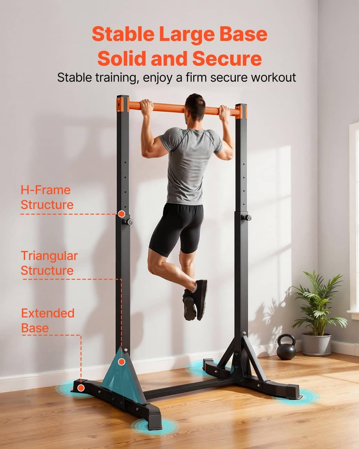 Stable pull up bar with large triangular base, black frame and orange top bar