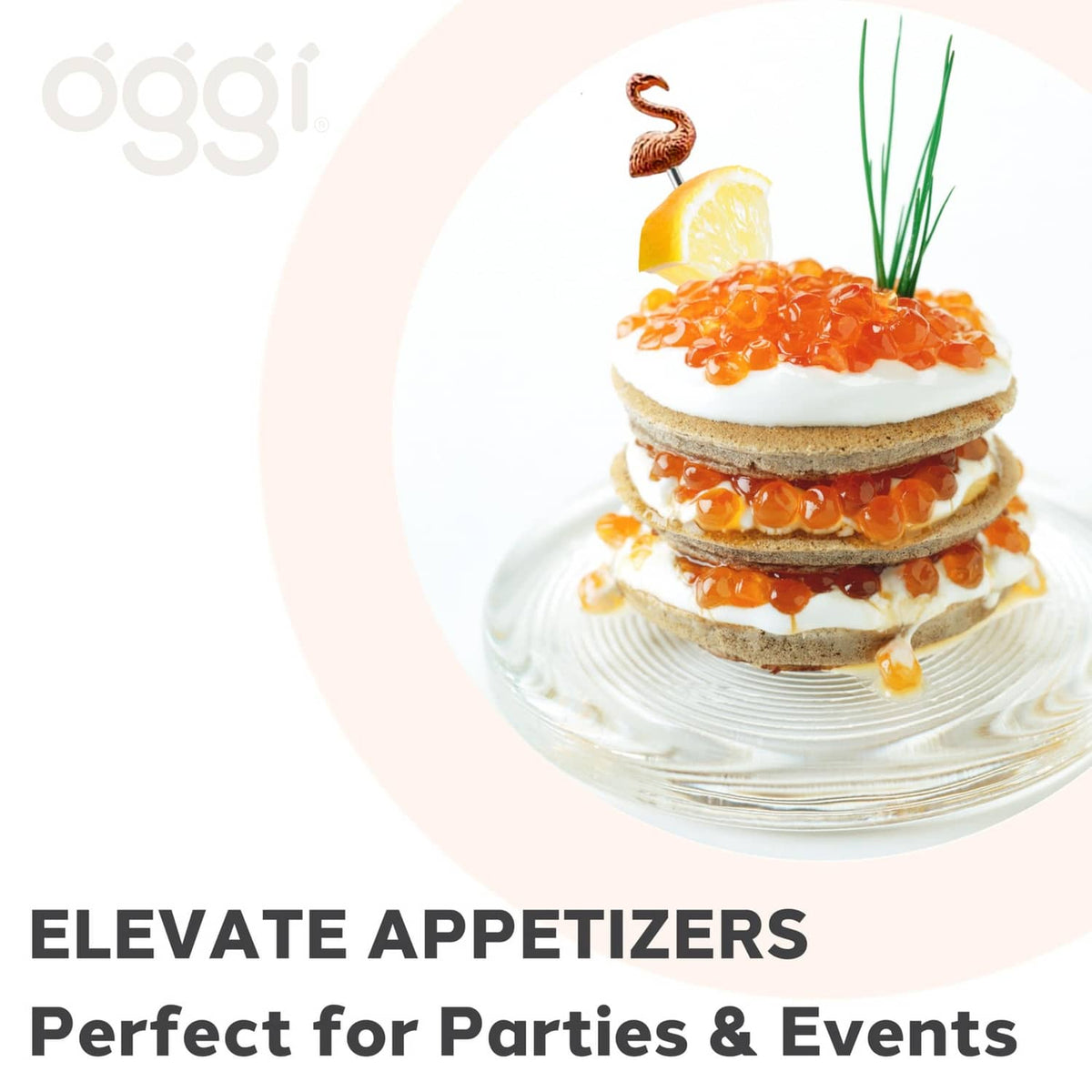 Flamingo cocktail pick on a layered appetizer, rose-gold flamingo head skewer