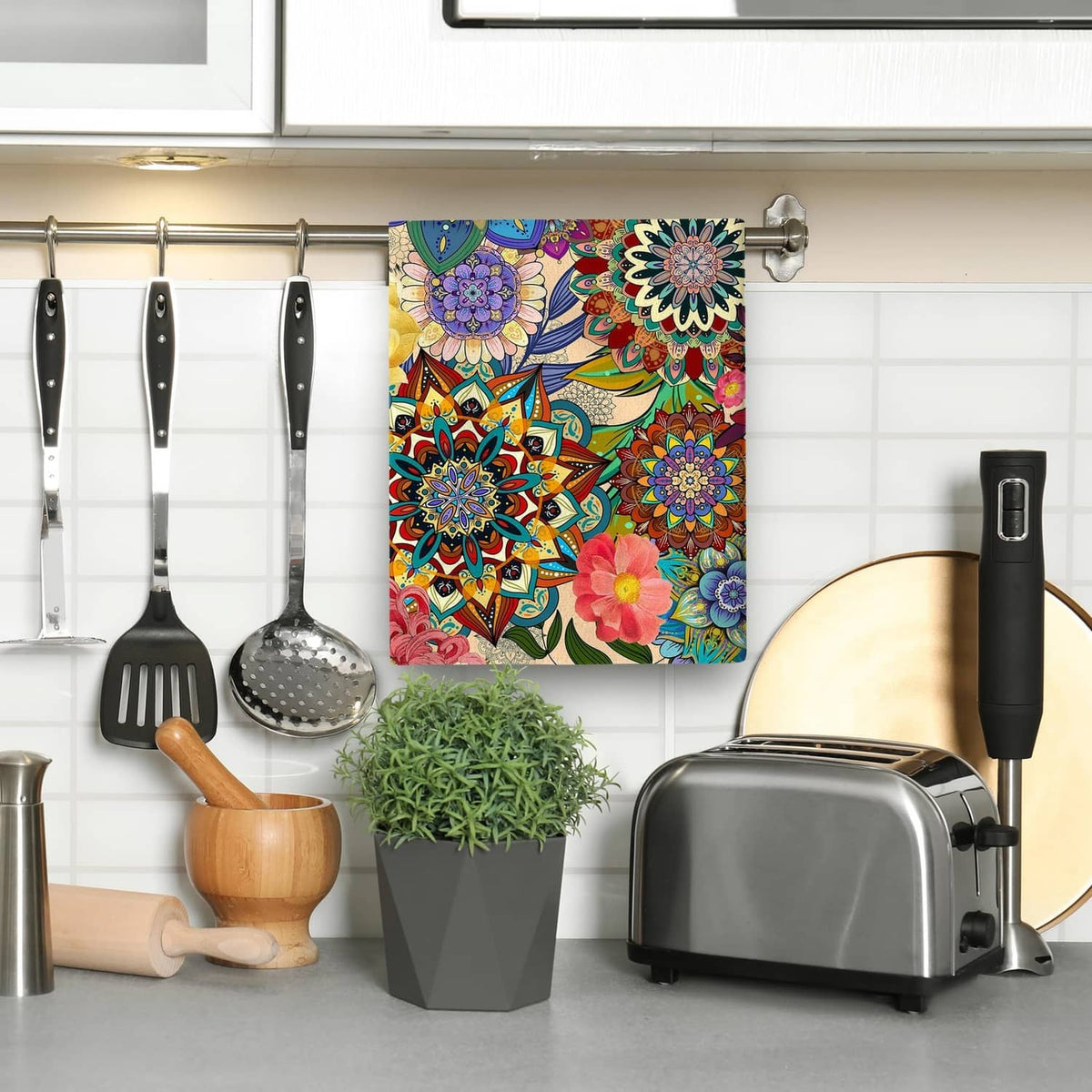 Boho floral kitchen towel pair on a wall rod, vibrant flower mandala design