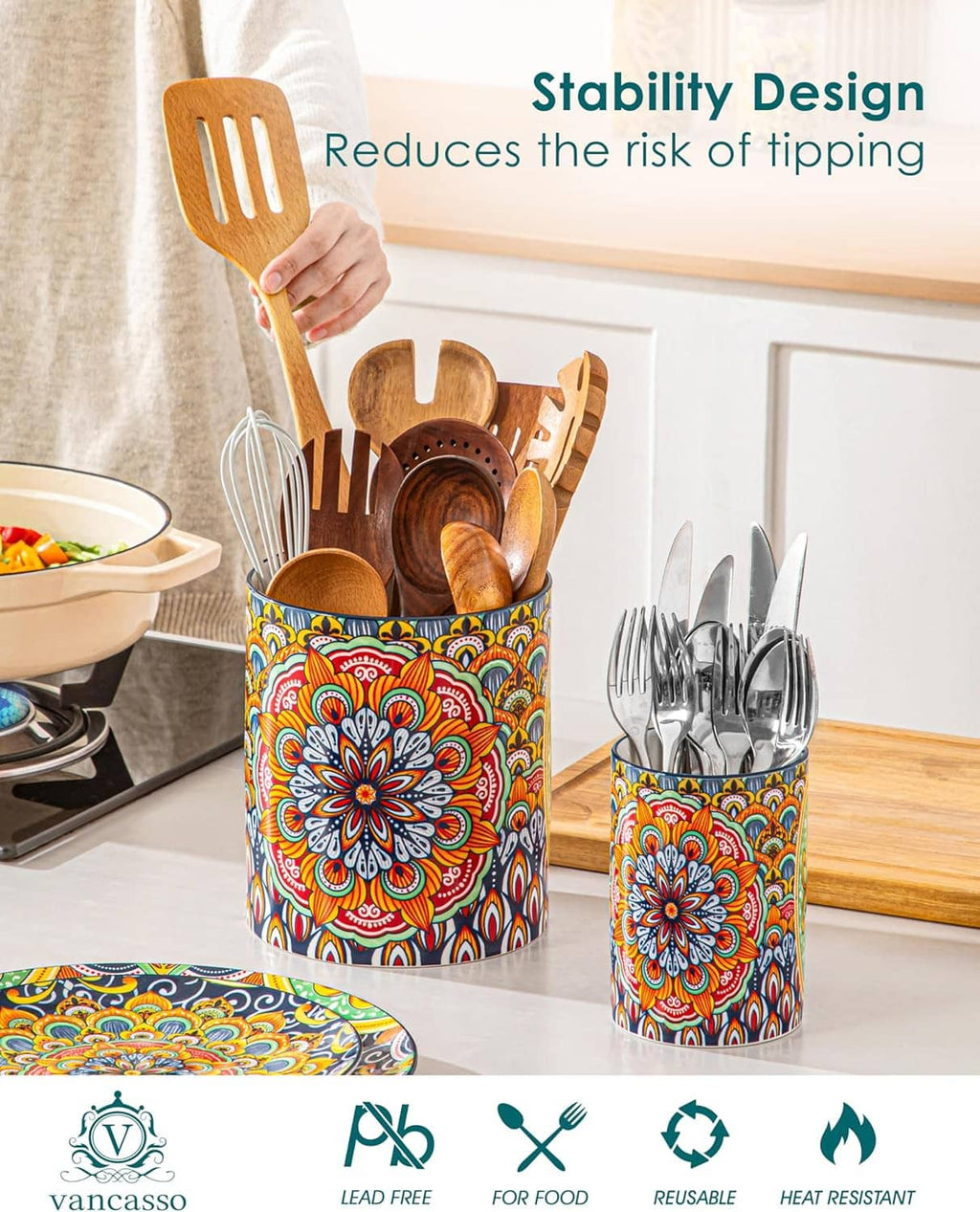 Colorful ceramic utensil crock set with floral mandala print, holding wooden kitchen utensils
