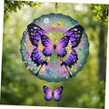 Purple and blue butterfly wind spinner with layered metal petals and hanging butterfly charm