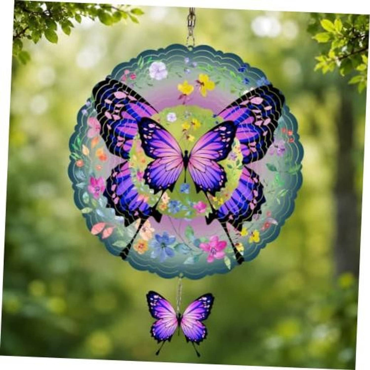 Purple and blue butterfly wind spinner with layered metal petals and hanging butterfly charm